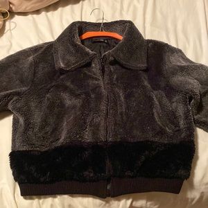 A gorgeous faux fur grey and black jacket (S). Selling due to size
